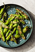 Grilled shishito peppers with sea salt