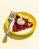 Strawberry galette with a dollop of cream