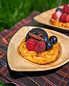 Japanese cheesecake with berries and Oreo biscuit