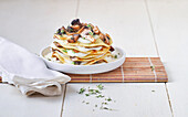Crêpe millefeuille with pioppini mushrooms