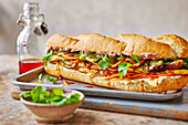Banh Mi with pork belly, vegetables and coriander