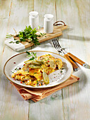 Hearty farmer's omelet with bacon and pickles