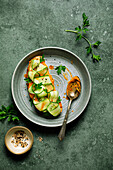 Sourdough bread with paprika hummus and courgette