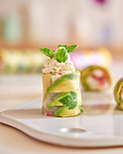 Rice leaf rolls with avocado, feta and quinoa