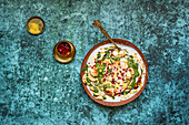 Papdi Chaat (Indian snack) made from crispy puris, yoghurt and chutneys