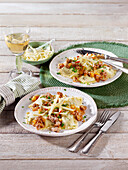 Tyrolean bacon ravioli with apple-sausage butter