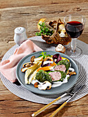 Cabbage rolls with minced meat filling and mushrooms