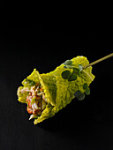 Savoy cabbage rolls with prawn filling