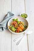 Carrot and courgette pasta with almond pesto