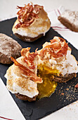 Gratinated snowball sandwiches with bacon