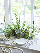 Elegant banquet table with flower arrangement