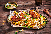 Vegan croquettes with chips, mustard and sauerkraut