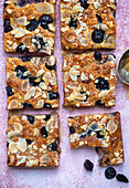 Cream cheese sheet cake with blueberries and almonds