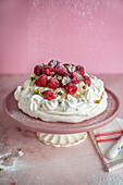 Pavlova from the slow cooker with raspberries and pistachios