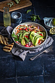 Cole slaw with cucumber, avocado, mint, chilli and lime dressing