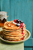 Pancakes with blueberries and honey