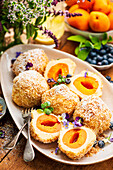 Apricot dumplings with bread crumbs