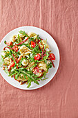 Mediterranean tortellini salad with rocket and baby mozzarella