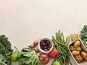 Fresh local produce from the market. Top view various ingredients for cooking healthy vegetarian meal with space for text