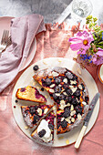 almond cake with fresh blackberries, view from above.