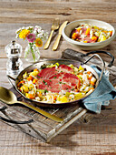 Farmer's stew from the oven with smoked pork, white cabbage and potatoes