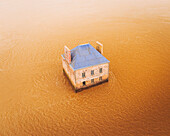 Nantes, France - 10 February 2021: Aerial view of the Maison dans la Loire by the French artist Jean-Luc Courcoult.