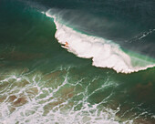 Aerial view of surfers, Bidart, France.