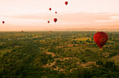 Aerial view of sunrise and hot air balloon, bagan, myanmar, burma