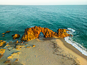 Aerial view of a natural arch along the coast in Jericoacoara, State of Ceara, Brazil.