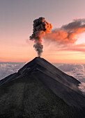 Aerial view of erupting Volcano Fuego with dramatic smoke and ash, Chimaltenango, Guatemala.