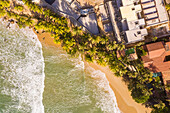 Aerial view of houses on the shore of the beach, Taiba, São Gonçalo do Amarante, Ceará, Brazil