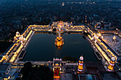 Aerial view of the Sri Harmandir Sahib, a Sikh pilgrimage site in Katra Ahluwalia, Amritsar, Punjab, India.