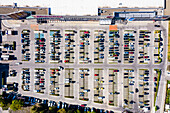 Aerial view of organized car parking and busy vehicles at Burgas Plaza Mall, Burgas, Bulgaria.