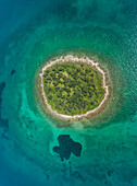 Aerial view of small islet of Itea called Agios Athanasios in Greece