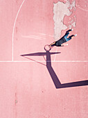 Aerial concept of a player on basketball court.