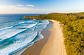 Aerial view of Alexandria beach during sunset, Noosa, Australia.