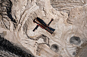 Aerial view of the industrial Sunshine Mine quarry with heavy machinery and sand extraction, Fellsmere, Florida, United States.