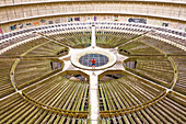 Aerial view of a person standing inside an abandoned Power Plant reactor in Charleroi, Belgium.