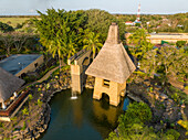 Aerial view of Oberoi Beach hotel and white sand beach, Balaclava, Mauritius.