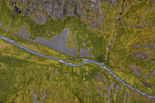 Aerial view of a river crossing Anderson Bay valley, Unalaska, Alaska, United States.