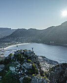 Aerial view of a person on Sentinel Peak along the Hout Bay, Cape Town, Western Cape, South Africa.