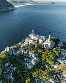 Aerial view of a person on Sentinel Peak along the Hout Bay, Cape Town, Western Cape, South Africa.