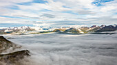 Aerial view of Unalaska Bay with fog on Unalaska island, Alaska, United States.