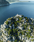 Aerial view of a person on Sentinel Peak along the Hout Bay, Cape Town, Western Cape, South Africa.