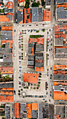 Aerial view of the historic main square with town hall and colorful tenements, Paczkow, Poland.