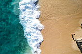 Aerial view of a person on the beach at Playa de los Amantes, Cabo San Lucas, Baja California, Mexico.