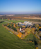 Aerial view of an old church in the middle of a village, Estonia.