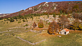 Aerial view of highest Croatian mountain Dinara landscape and old house on it. Situated near the city of Knin in Dalmatia, Croatia.