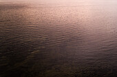 Aerial view of baltic sea with shades of pink in Estonia.