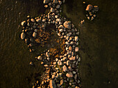 Aerial view of rocky landscape in sunset light in Estonia.